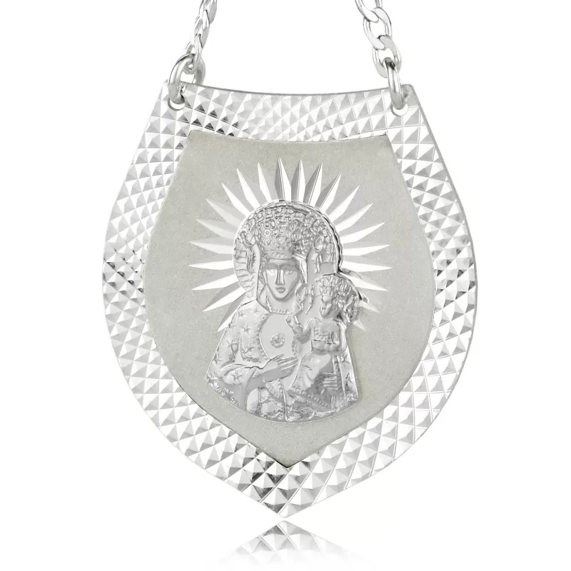srebrny ryngraf z matką boską na pamiątkę chrztu świętego